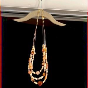 Chico’s women’s three  strand necklace brown and cream color.